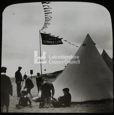 Boys Outside Tent With Flagpole