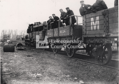 L1724 - Navvies in tipping wagons, Leicestershire