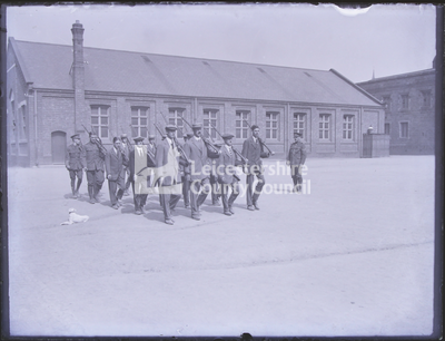 Yeomen parading in training yard with rifles