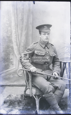 Young soldier posing in studio