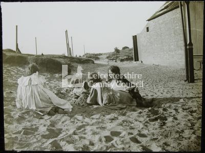 Leicester poor boys - Four girls sitting on beach