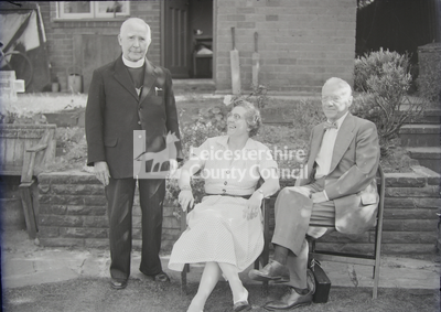 Dr Williams, wife seated in garden