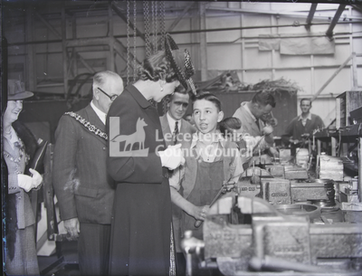 Duchess of Kent's Visit To Leicester: Talking To Boy Inside A Factory