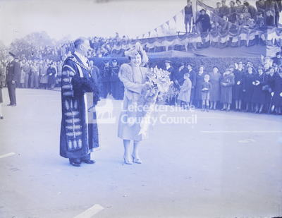 Royal Visits - Queen mother with bouquet