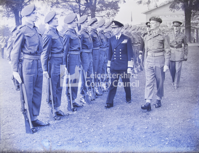 Royal Visits -  George VI inspecting line of troops
