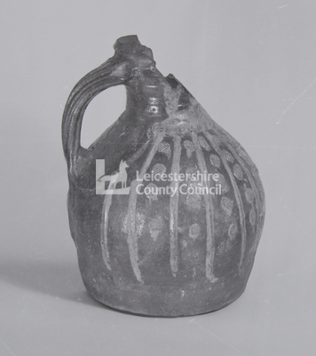Ornate Mediaeval round jug