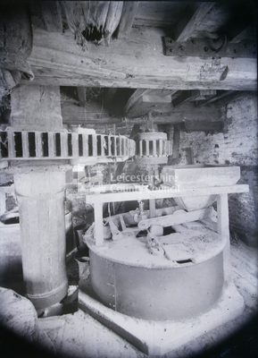 Mill interior with grinder		