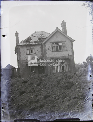 Glen Parva: Shelled house on hill
