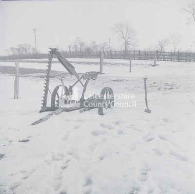 Mowing machine in snow