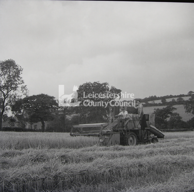 Combine harvester being operated in field