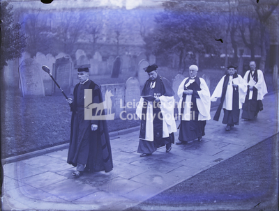 Procession outside Cathedral with five clergy