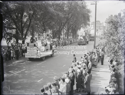 Parade: view down street with floats -Lord Mayor's Show 1961