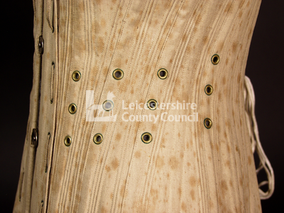 Ventilated corset with removable busk, 1885: Detail of eyelets