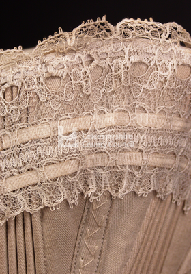 Corset with hand stitched detail, 1885: Detail of lace